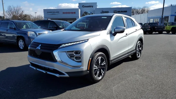 Pictured is a brand new silver 2023 Mitsubishi Eclipse Cross parked in front of Jeff D' Ambrosio Mitsubishi of Oxford.